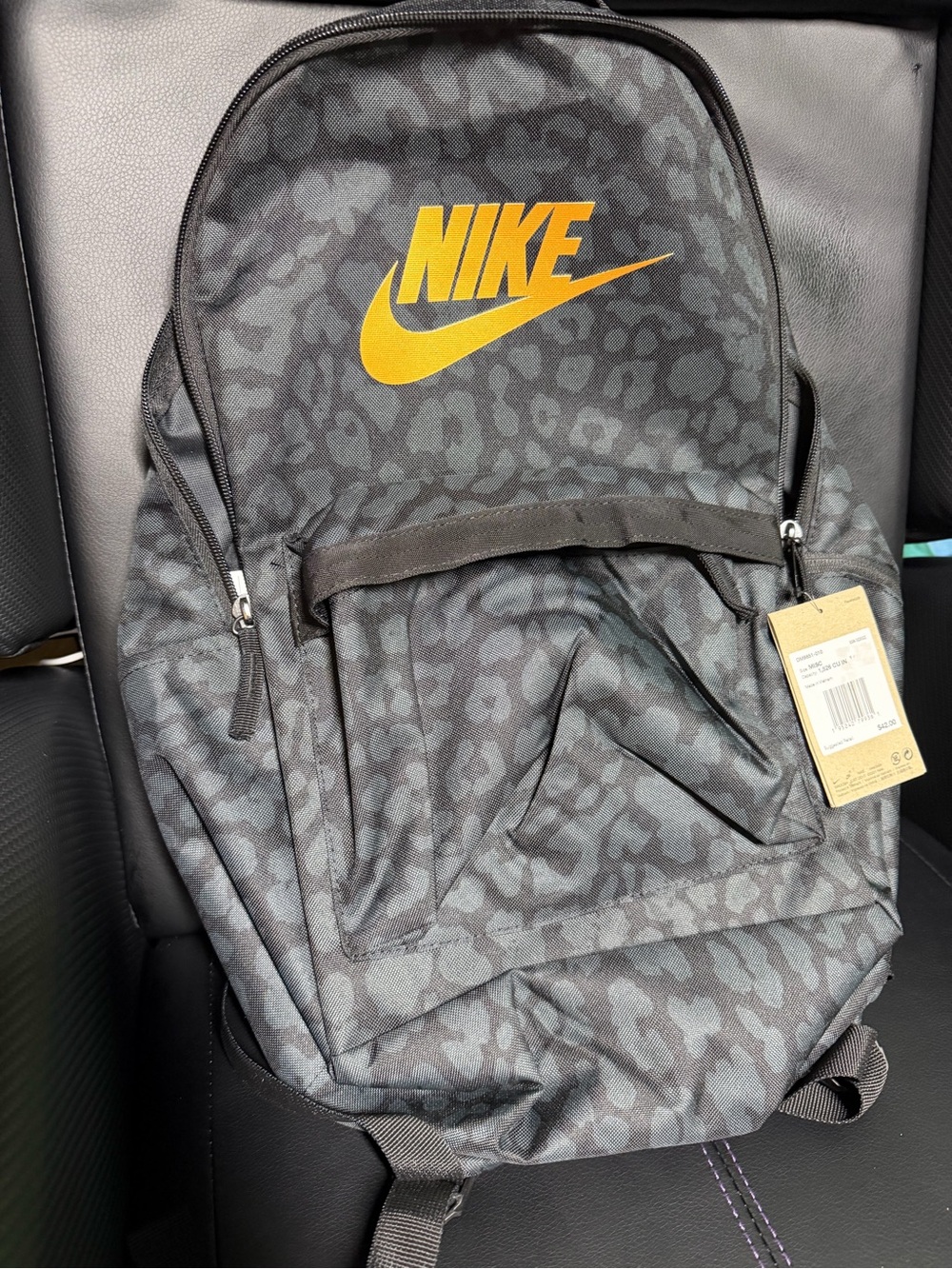 Nike Men's Black Leopard Print Backpack with Yellow Logo